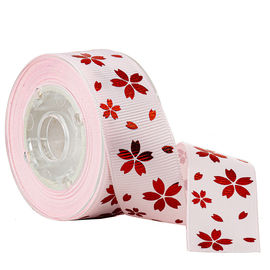 Folien-rote Goldblume auf Rosa Druckgrosgrain-Band für Feiertags-Dekoration